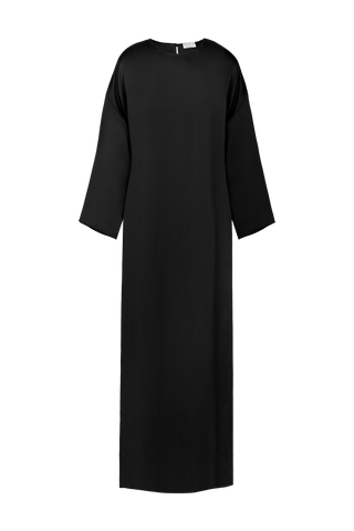 Black silk Alma dress by HERTH with a fluid silhouette and long sleeves. Available at ASSOLUTO boutique in Rome.
