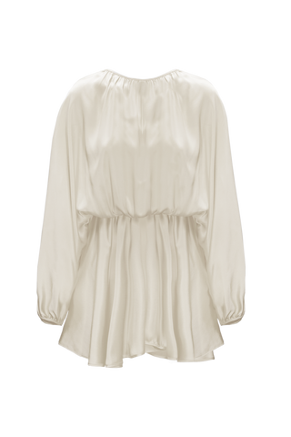 HERTH Ema silk mini dress in almond, crafted in Italy from GOTS-certified organic silk. Available at ASSOLUTO boutique.