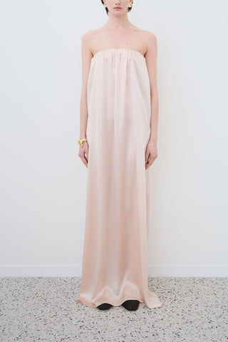 HERTH Erin off-shoulder maxi dress in organic silk — elegant sustainable womenswear made in Italy curated at Assoluto Boutique.