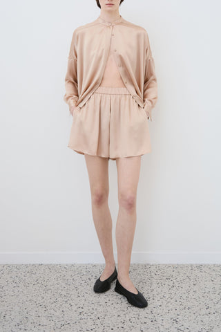 HERTH Tess silk shirt and Hani silk shorts in sand — sustainable organic silk womenswear crafted in Italy available at Assoluto Boutique.