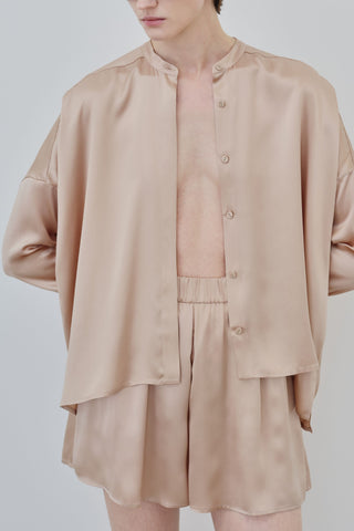HERTH Tess silk shirt in Sand, crafted in Italy from GOTS-certified organic silk. Available at ASSOLUTO boutique.