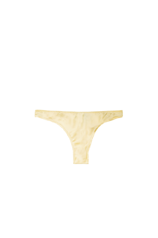 HERTH Zoe low-rise panty in Yellow Butter, made from GOTS-certified organic silk and available at ASSOLUTO boutique.