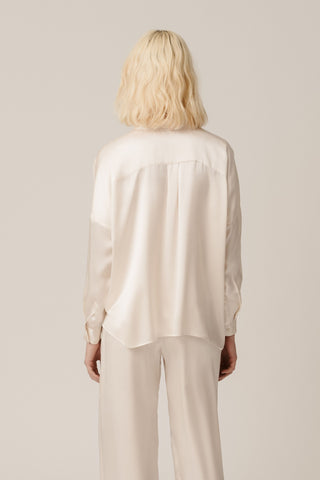 Back view of HERTH Tara shirt in Almond organic silk — elegant sustainable design made in Italy, available at ASSOLUTO boutique.